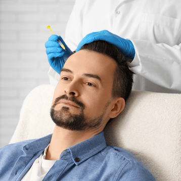 Professional hair transplantation procedure in modern clinic