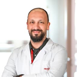 Dr. Mert Aker